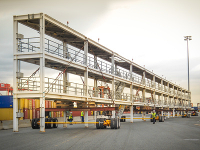 A reefer rack is moved with Buckingham Dollies and SmartSteer® System