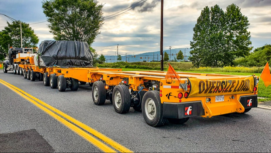 Yellow Faymonville HighwayMAX-s Trailer with load