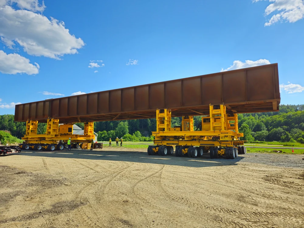 Multiple power units can be linked for more dolly capacity; X/Y coordinate-based setup for accurate positioning