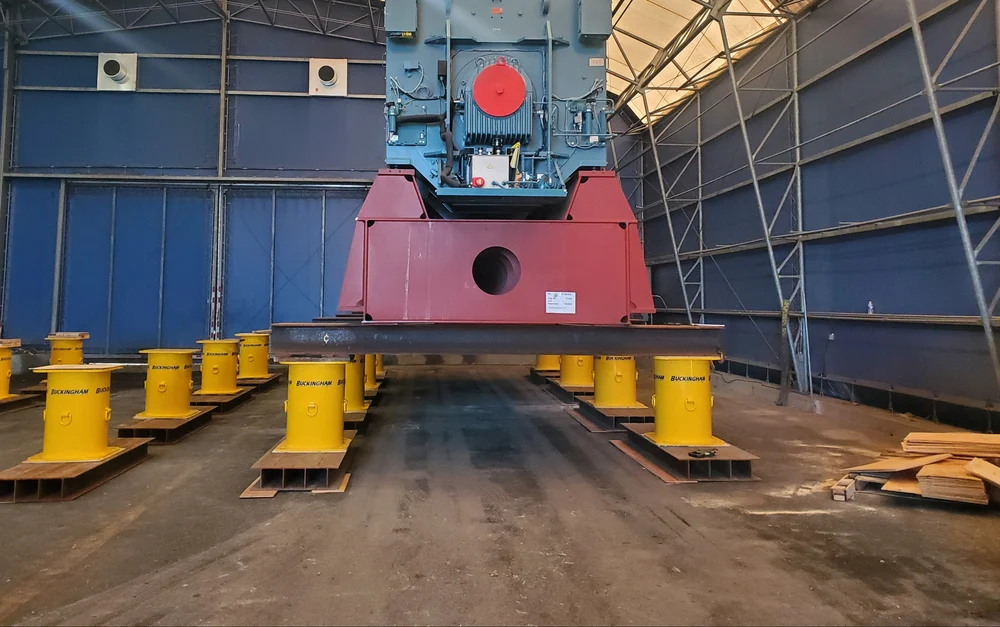 Built with a wide base and top plate design to provide solid footing and confident load support during setup operations.